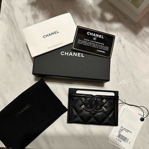 Chanel card holder. Plus fits money on the inside pocket. Brand new